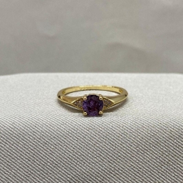 ANEL COM ZIRCONIA REDONDA ROXA