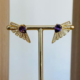 BRINCO CRAVEJADO COM ZIRCONIA ROXA