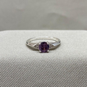 ANEL COM ZIRCONIA REDONDA ROXA