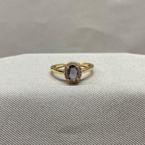 ANEL PEDRA OVAL LILAS CRAVEJADA EM VOLTA