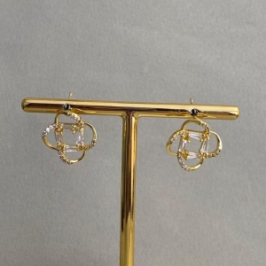 BRINCO FLOR VAZADA COM ZIRCONIA
