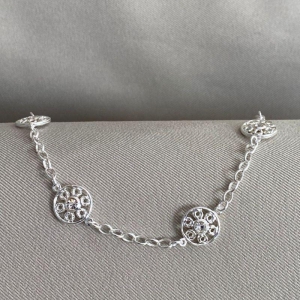 PULSEIRA DETALHE REDONDO COM ZIRCONIA