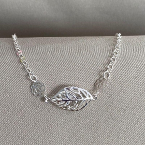 PULSEIRA FLOR E FOLHA COM ZIRCONIAS DENTRO