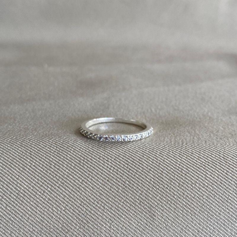 ANEL APARADOR CRAVEJADO COM ZIRCONIAS