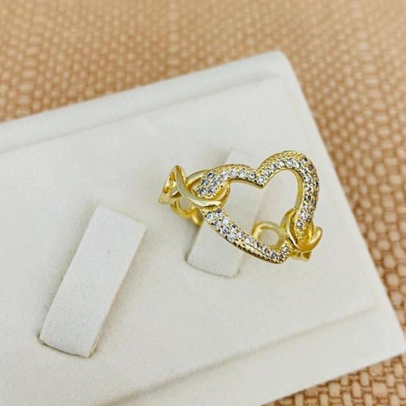 ANEL CORAÇÃO CRAVEJADO VAZADO INFINITO