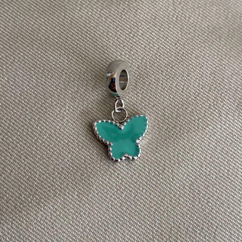 BERLOQUE PENDURICALHO DE BORBOLETA RESINADA AZUL