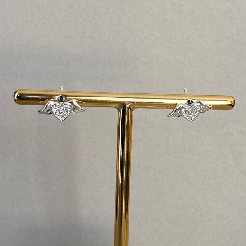 BRINCO CORAÇÃO CRAVEJADO COM ASAS