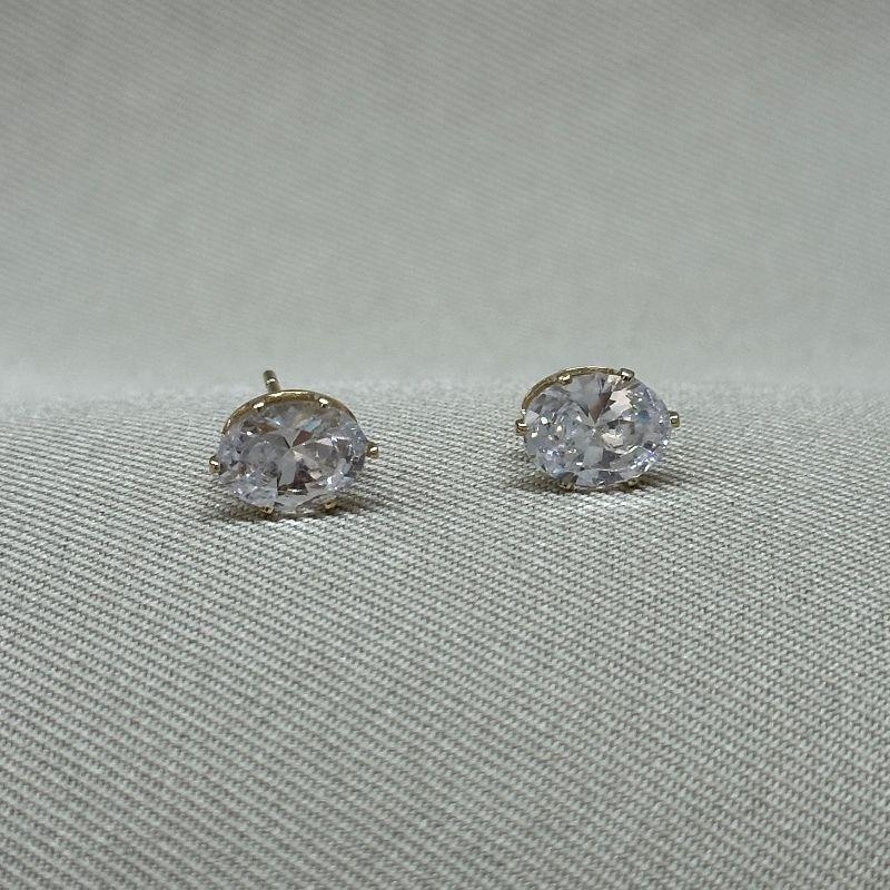 BRINCO DE ZIRCONIA OVAL CRISTAL 6X8MM