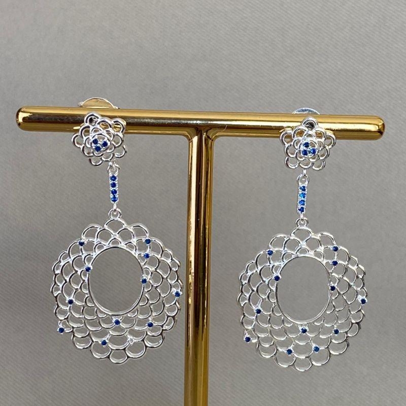 BRINCO FLOR COM ZIRCÔNIA AZUL