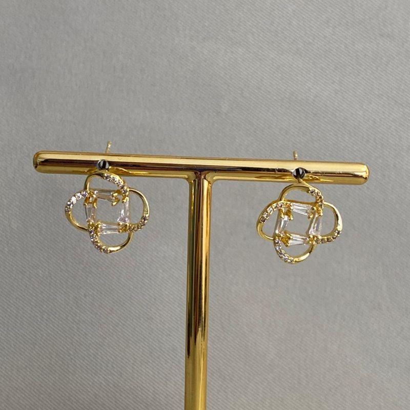 BRINCO FLOR VAZADA COM ZIRCONIA