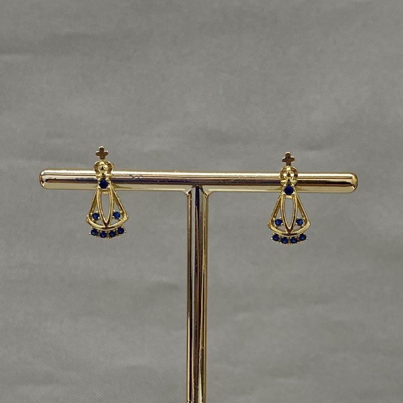 BRINCO NOSSA SENHORA COM ZIRCONIAS AZUIS