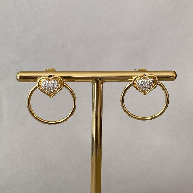 BRINCO REDONDO COM CORAÇÃO CRAVEJADO