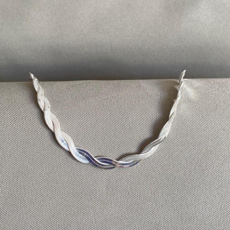 COLAR FITA ENTRELAÇADA