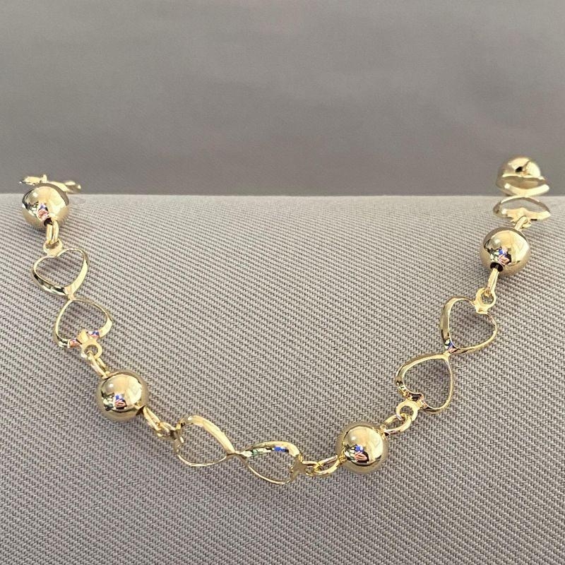 PULSEIRA BOLINHAS COM CORAÇÃO