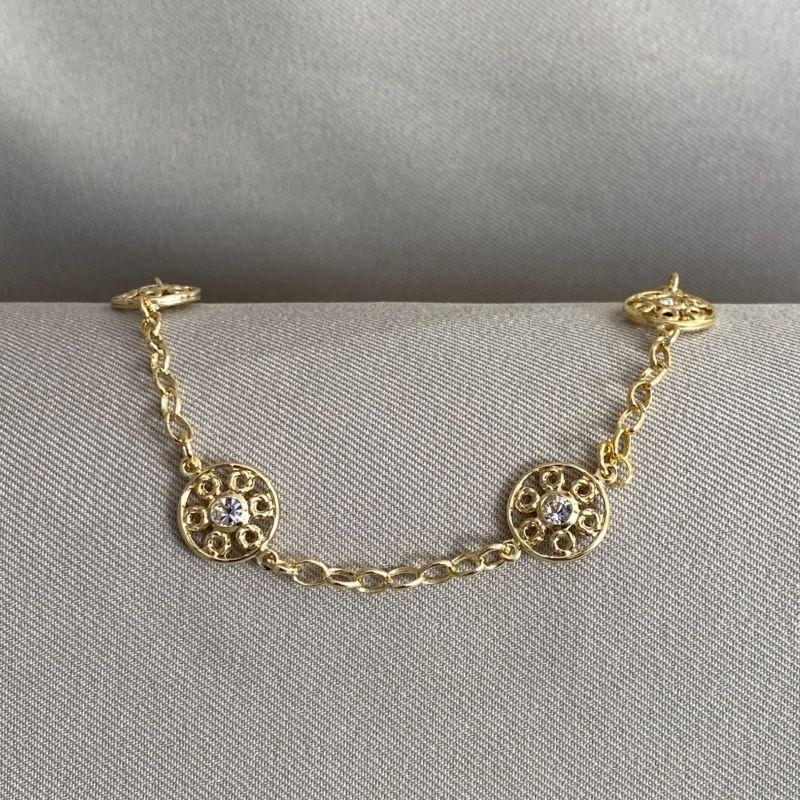 PULSEIRA DETALHE REDONDO COM ZIRCONIA