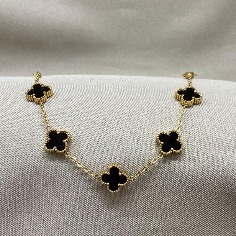 PULSEIRA DOURADA 5 TREVOS PRETOS STEEL