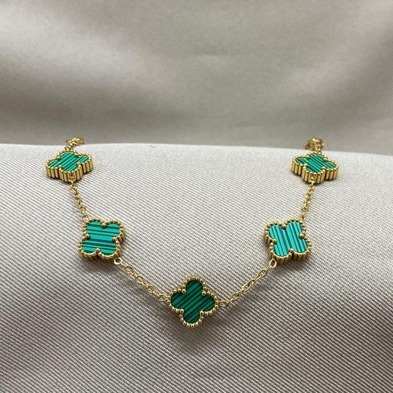 PULSEIRA DOURADA 5 TREVOS VERDES STEEL