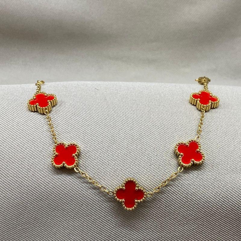 PULSEIRA DOURADA 5 TREVOS VERMELHOS STEEL