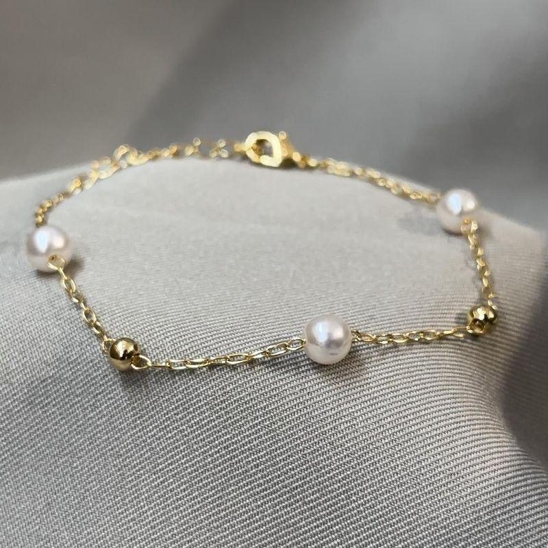 PULSEIRA FEMININA DE PÉROLAS COM BOLINHAS