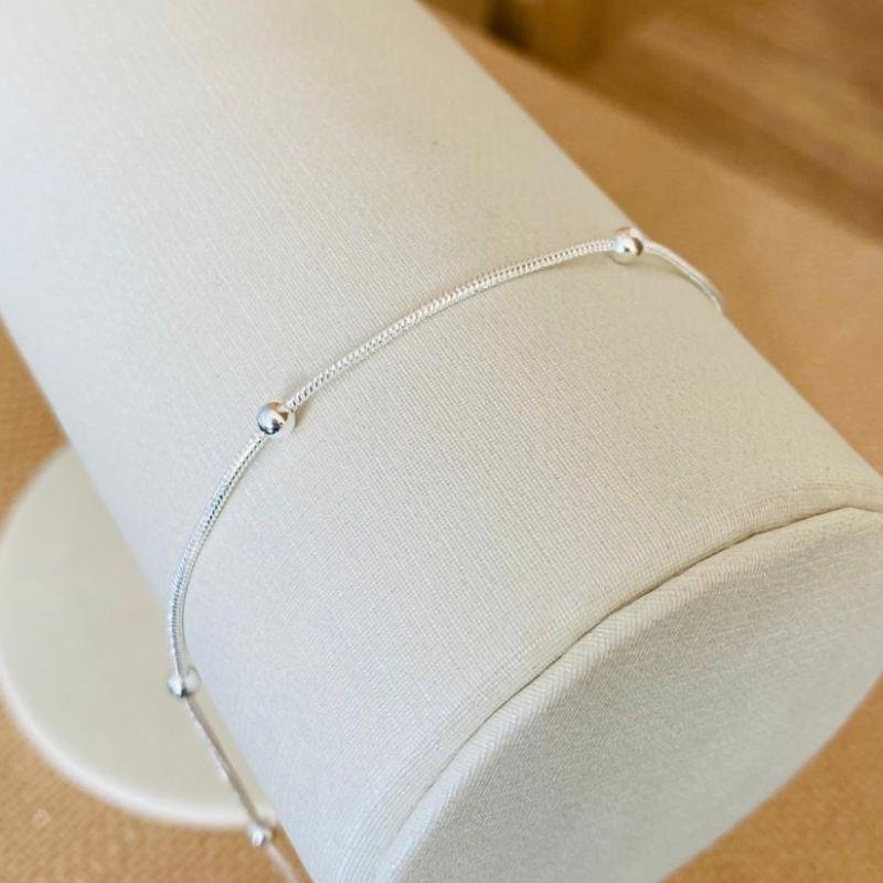 TORNOZELEIRA BOLINHAS