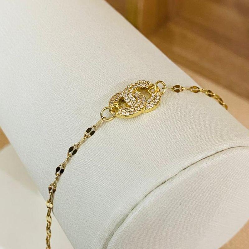 PULSEIRA COM CÍRCULOS CRAVEJADOS