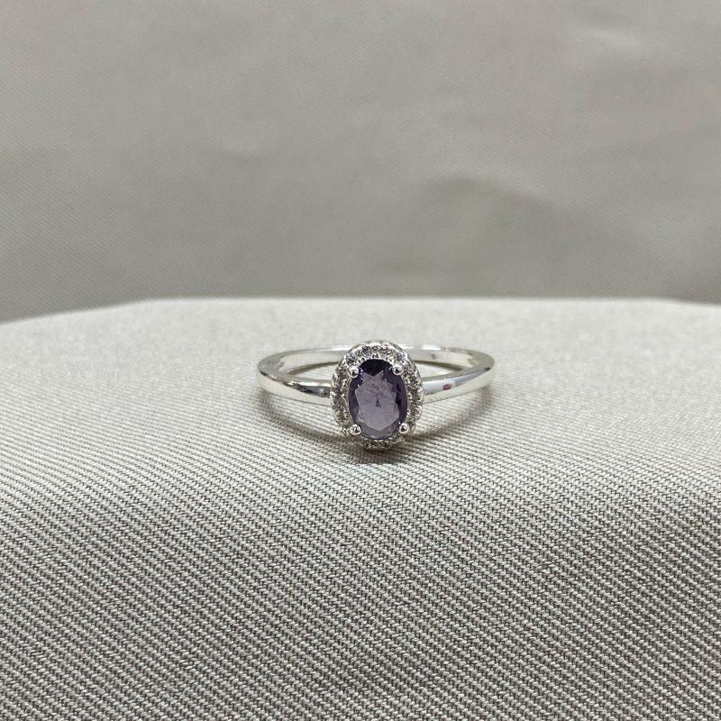 ANEL PEDRA OVAL LILAS CRAVEJADA EM VOLTA