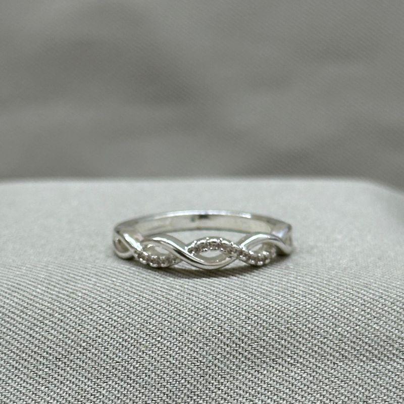 ANEL TRANÇADO COM ZIRCÔNIAS