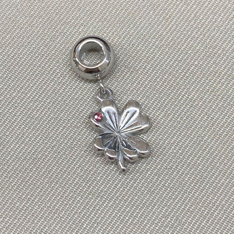 BERLOQUE FLOR COM UMA ZIRCONIA ROSA PENDURICALHO