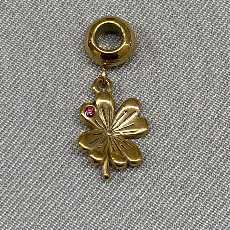 BERLOQUE FLOR COM UMA ZIRCONIA ROSA PENDURICALHO