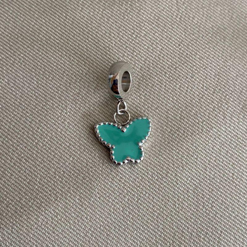 BERLOQUE PENDURICALHO DE BORBOLETA RESINADA AZUL