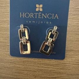 BRINCO 2 QUADR. LISOS C/ELOS CRAV. NO MEIO