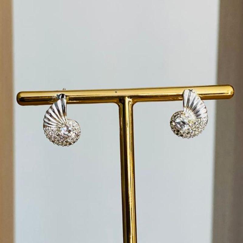 BRINCO CONCHA CRAVEJADO