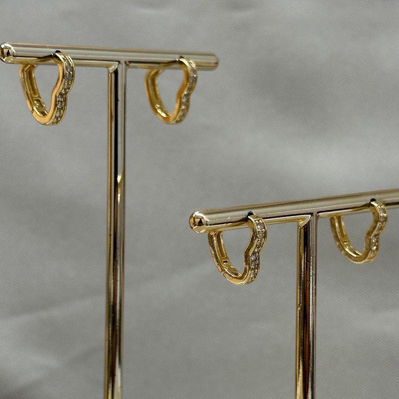 BRINCO DUPLA CORAÇÃO CRAVEJADO