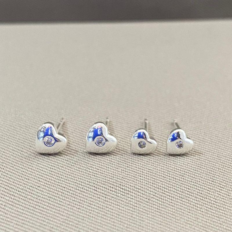 BRINCO DUPLA CORAÇÕES COM ZIRCONIA