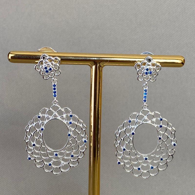 BRINCO FLOR COM ZIRCÔNIA AZUL