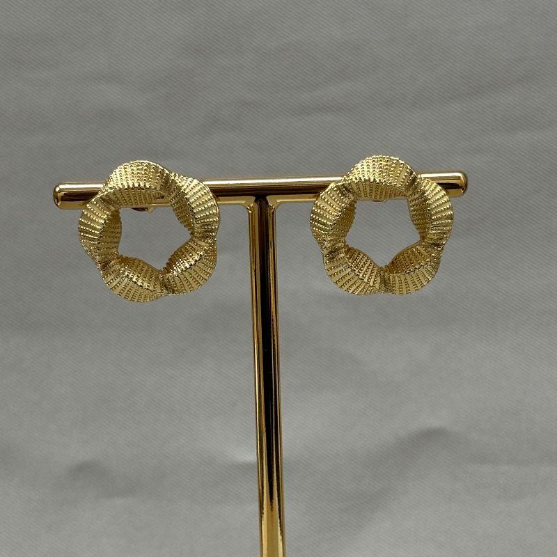 BRINCO FLOR TRANÇADA