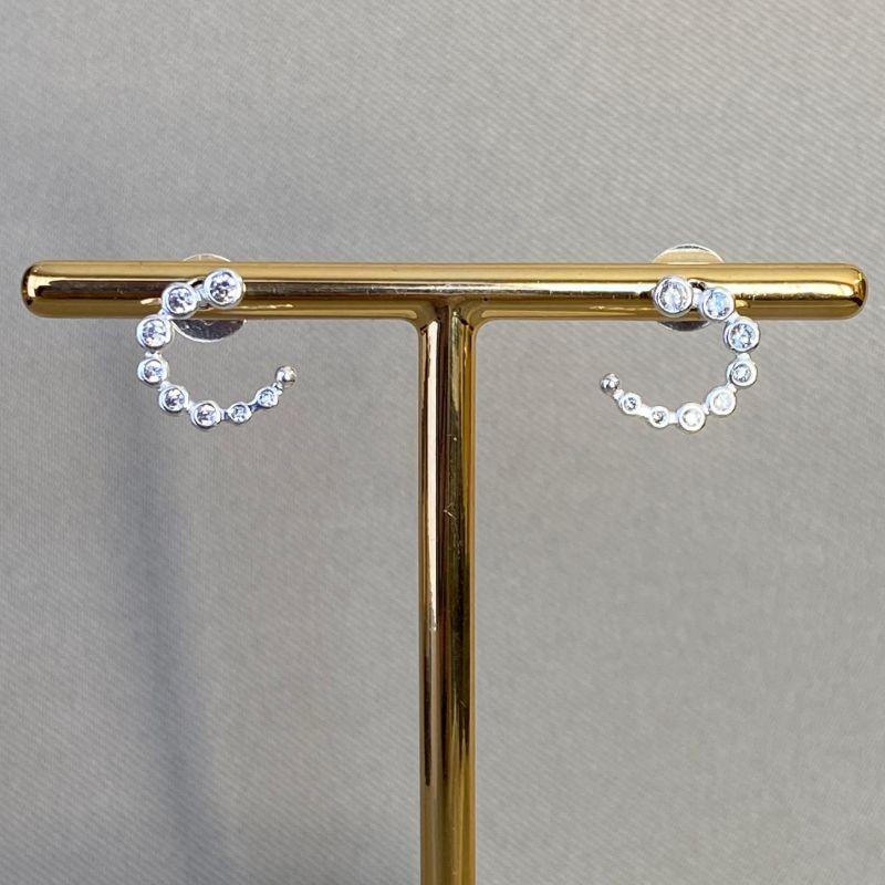 BRINCO MEIA LUA COM ZIRCONIAS