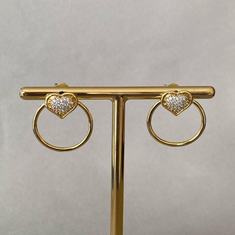 BRINCO REDONDO COM CORAÇÃO CRAVEJADO