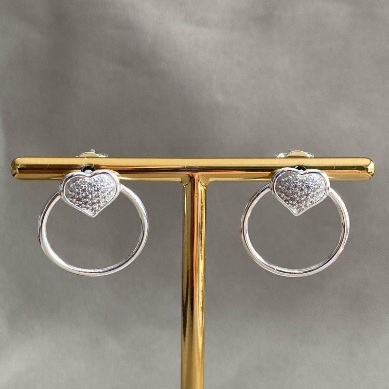 BRINCO REDONDO COM CORAÇÃO CRAVEJADO