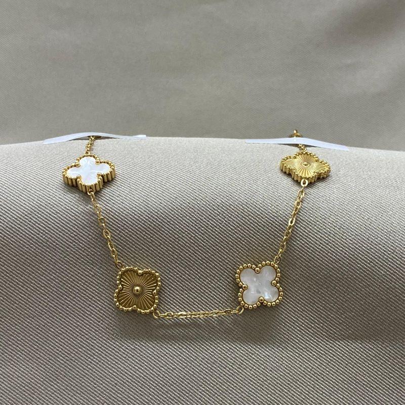 PULSEIRA 4 TREVOS BRANCO E DOURADOC STEEL