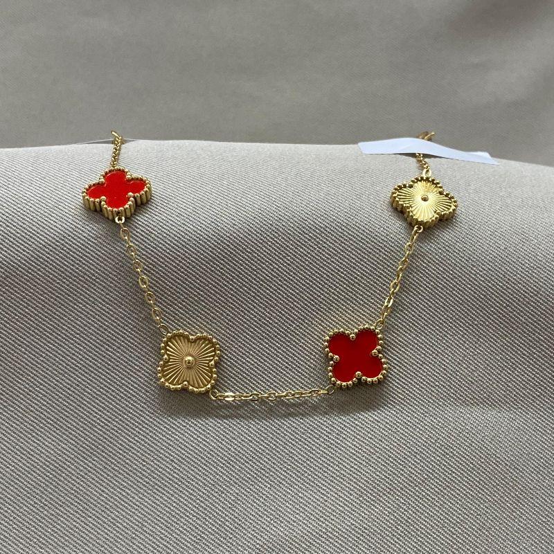 PULSEIRA 4 TREVOS VERMELHO E DOURADO STEEL