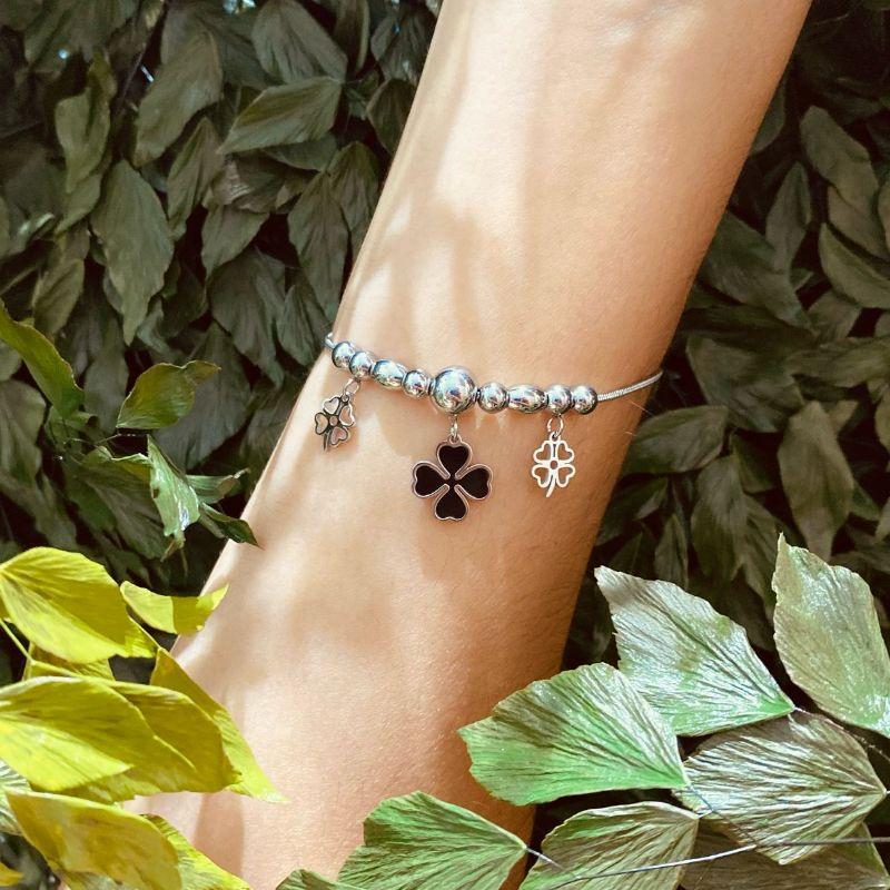 PULSEIRA BOLINHAS E TREVO PRETO E VAZADO