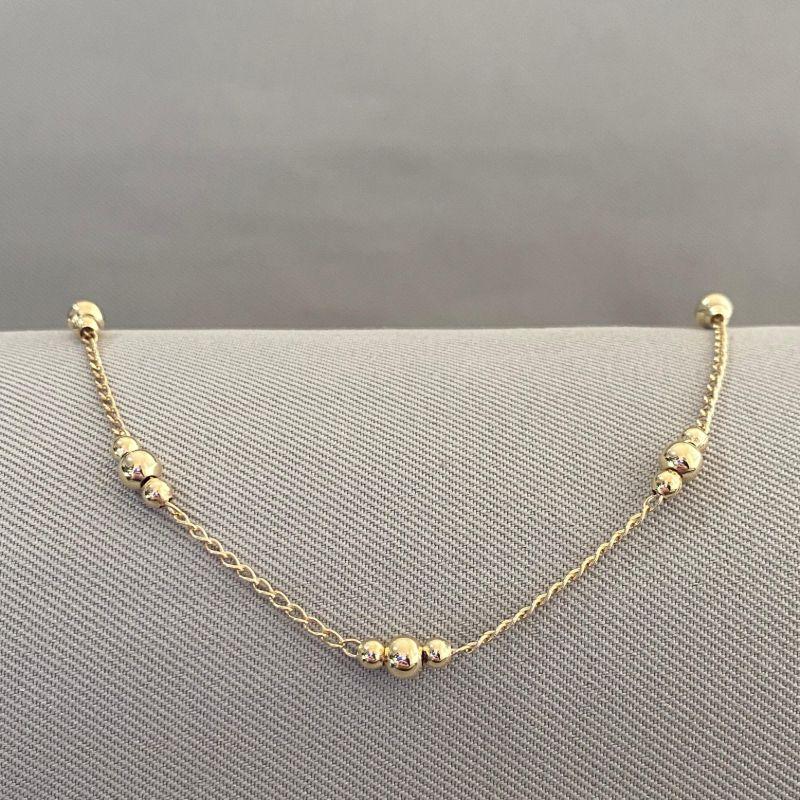 PULSEIRA BOLINHAS ELO CADEADINHO