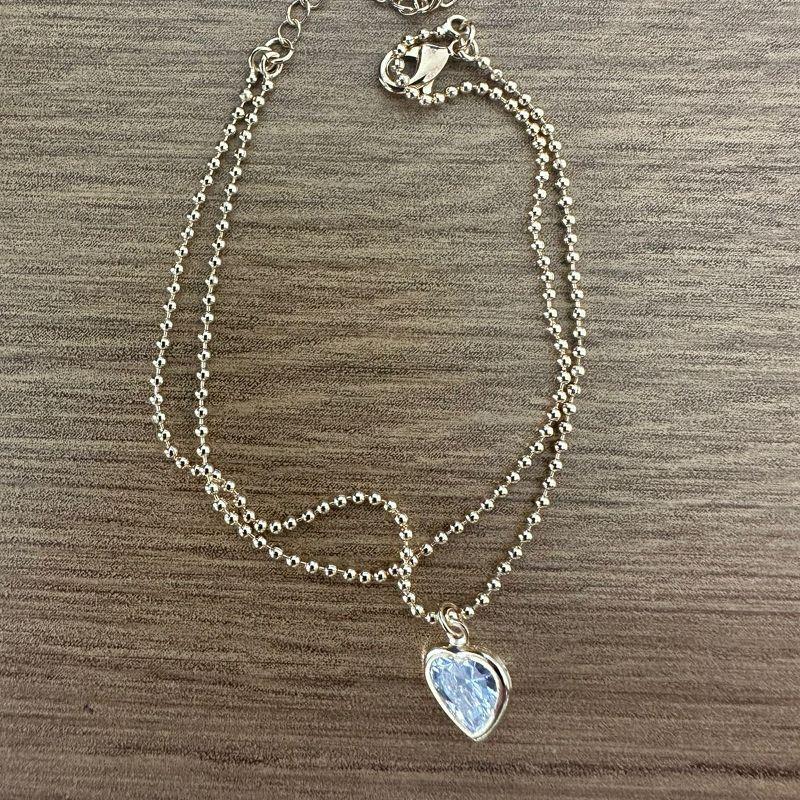 PULSEIRA DUPLA BOLINHA CORAÇÃO CRISTAL