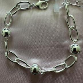 PULSEIRA ELOS C/BOLAS