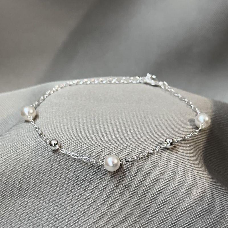 PULSEIRA FEMININA DE PÉROLAS COM BOLINHAS