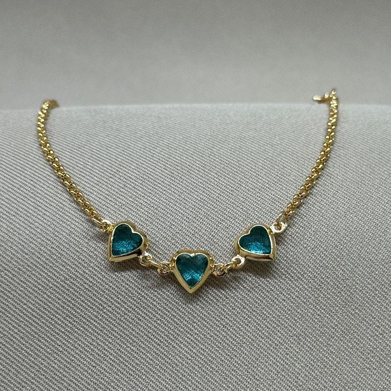 PULSLEIRA ELO PORTUGUES E CORAÇÕES 6MM EM TIFANI ACQUA MARINA