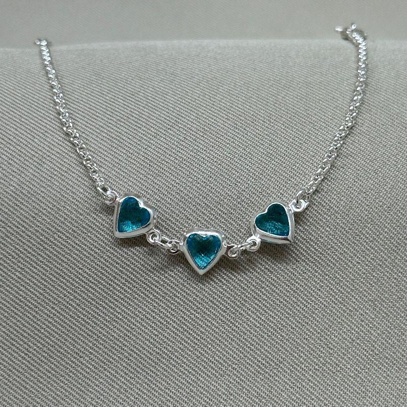 PULSLEIRA ELO PORTUGUES E CORAÇÕES 6MM EM TIFANI ACQUA MARINA