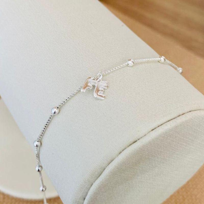 TORNOZELEIRA FÉ BOLINHAS