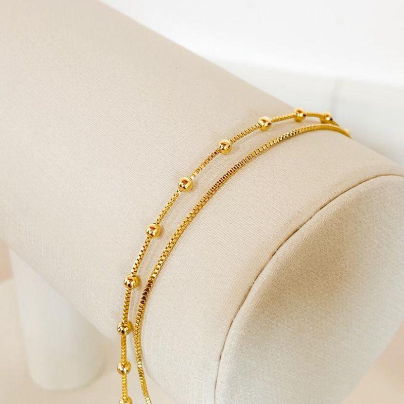 PULSEIRA DUPLA BOLINHAS